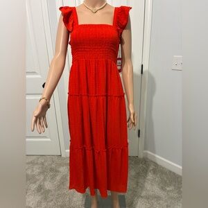 Red Smocked Ruffle Sleeve Dress by Vince Camuto.